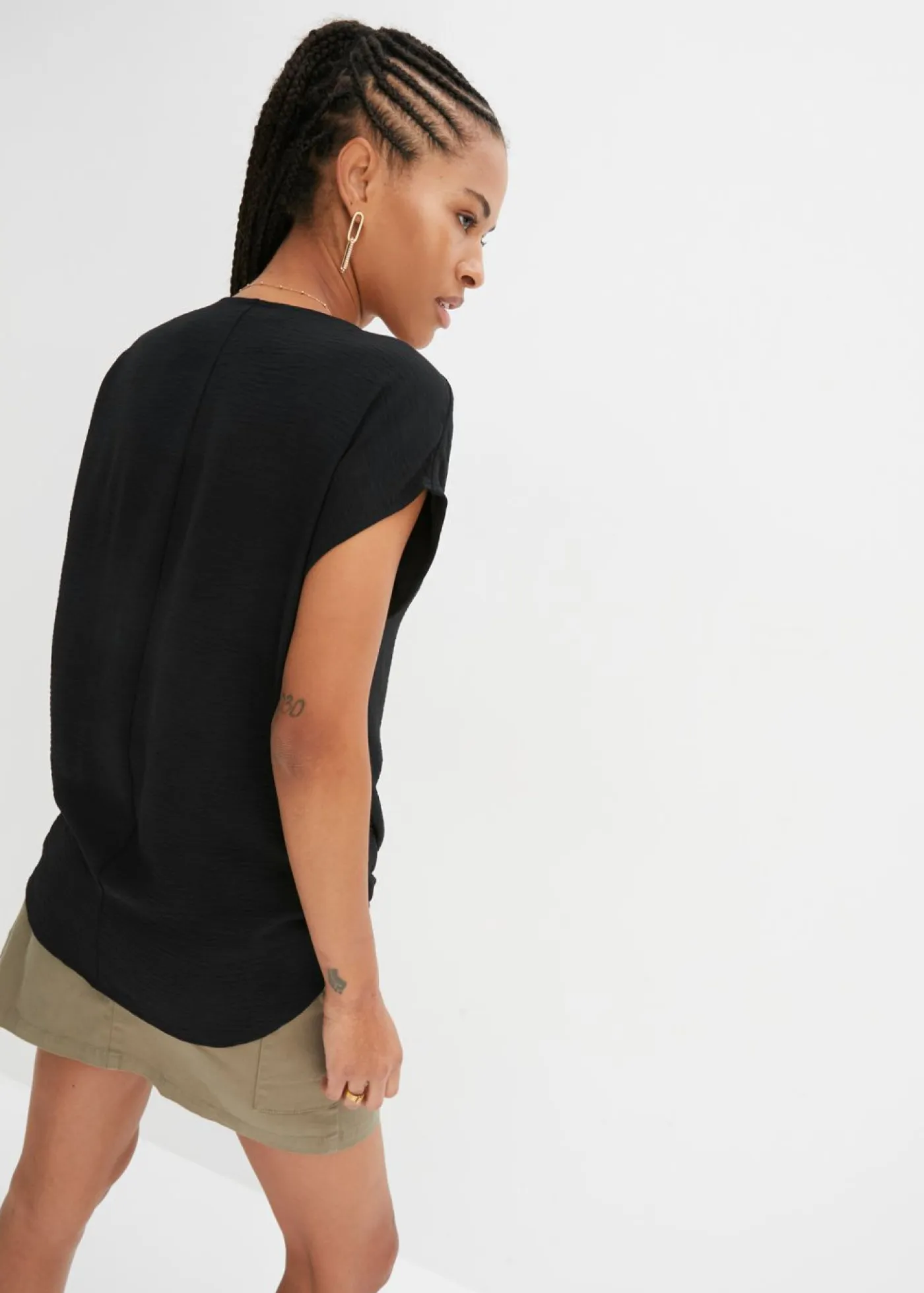 Sale Top asimétrico Mujer Camisetas